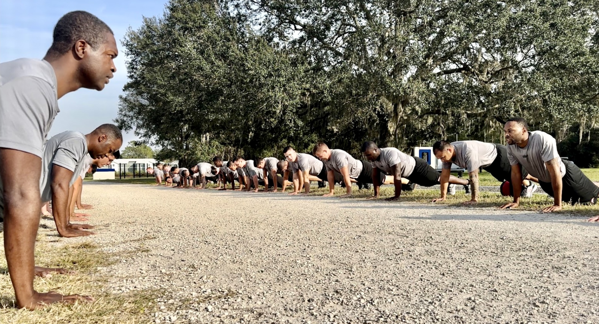 Deputy recruits doing push ups