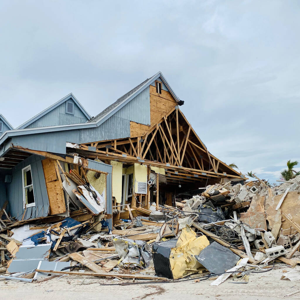 house near the beach destroyed by a hurricane