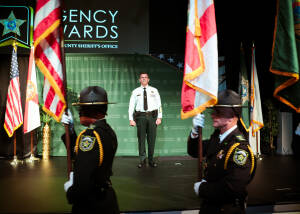 Sheriff Mina on stage at the agency awards