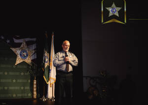 an individual speaking on stage