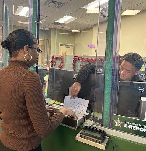 Records custodian assisting someone with an E-report