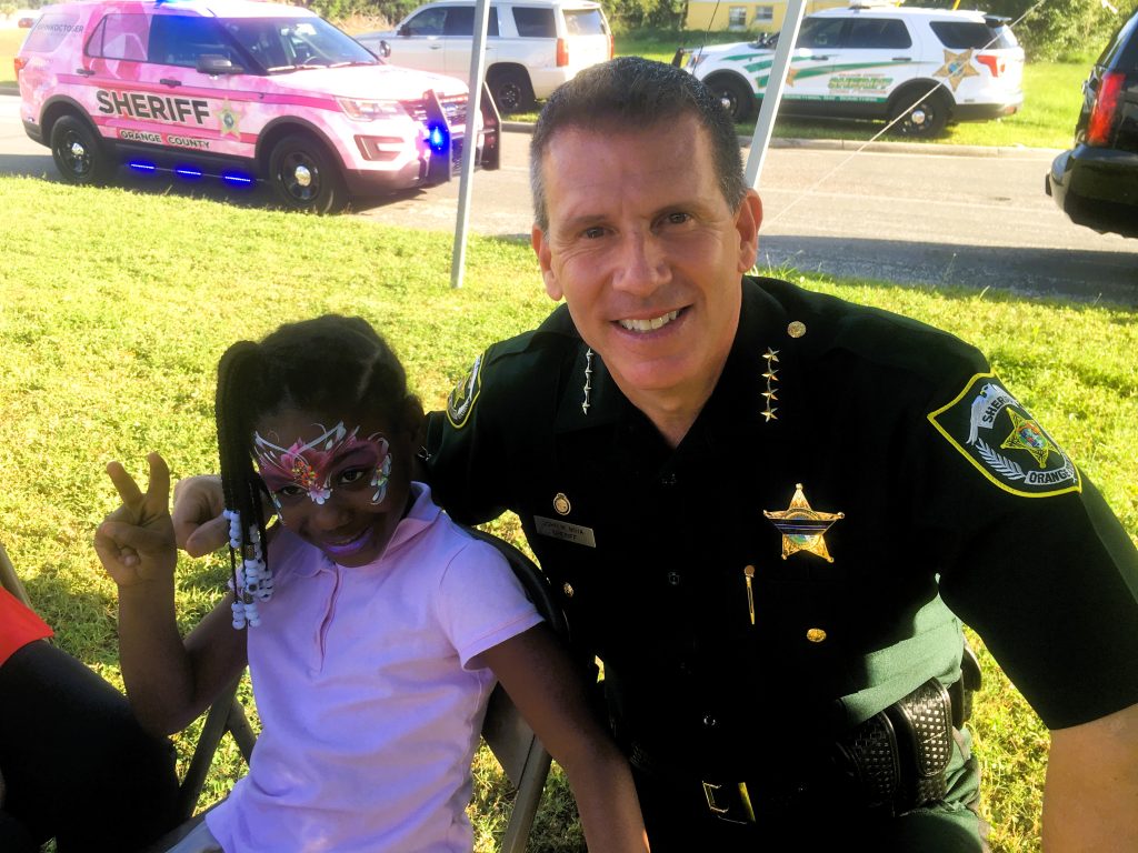 Sheriff Mina and kid with face paint